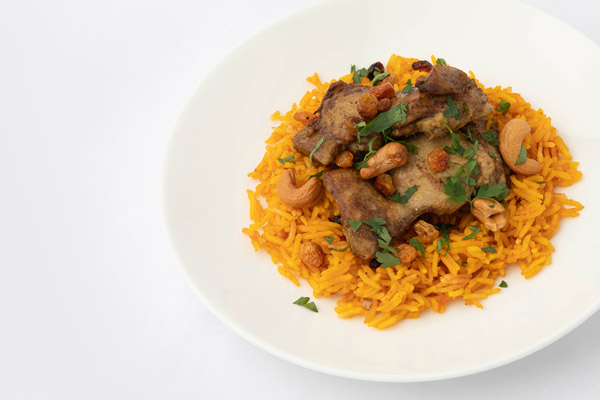 Chicken machbous - Roast chicken thigh Scented basmati rice, cashew raisins, dukkus sauce