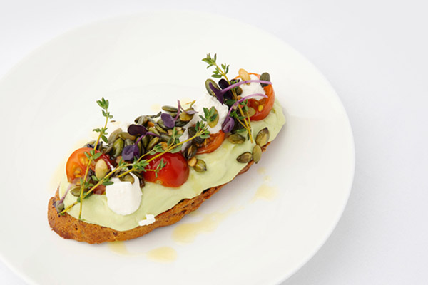 Creamed avocado - Feta, pumpkin seeds, tomato on roast sourdough