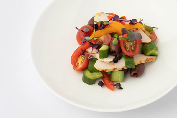 Grilled chicken salad - Cherry tomato, kalamata olives, cucumber roasted capsicum, virgin olive oil